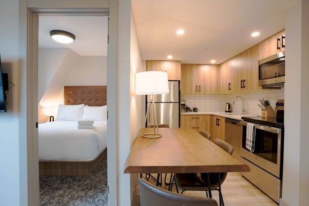 Basecamp suites banff - 2 bedroom apartment kitchen-bedroom.jpg