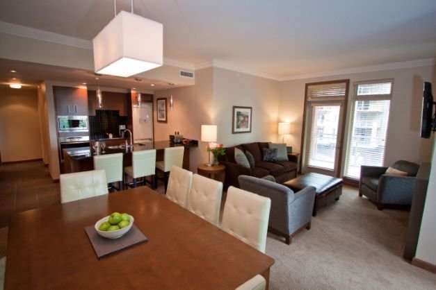 Revelstoke the sutton place hotel 3 bedroom suite living & dining areas.jpg