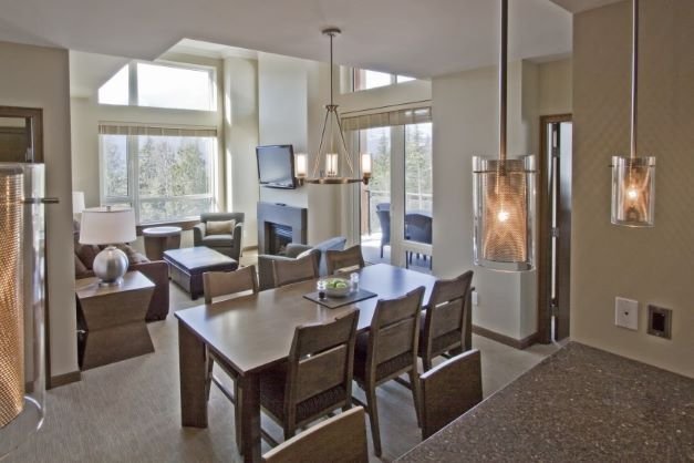 Revelstoke the sutton place hotel 2 bedroom suite living & dining areas.jpg