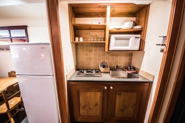 white crystal inn superior kitchenette hotel room kitchenette.jpg