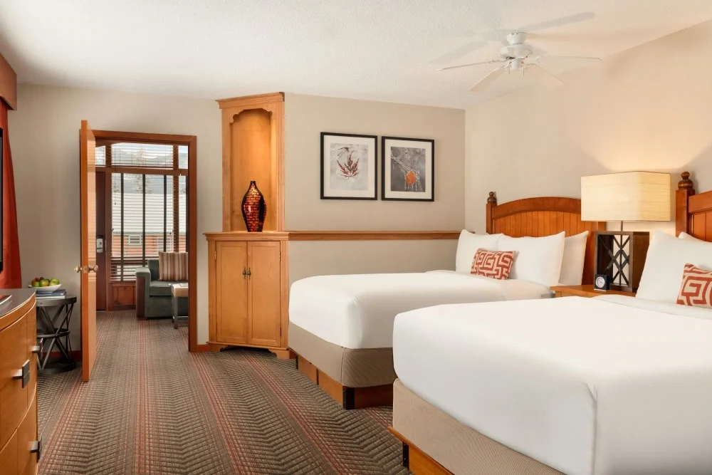 Fairmont Jasper Park Lodge Junior Suite Fireplace Bedroom to Living